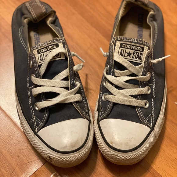 navy blue slip on converse